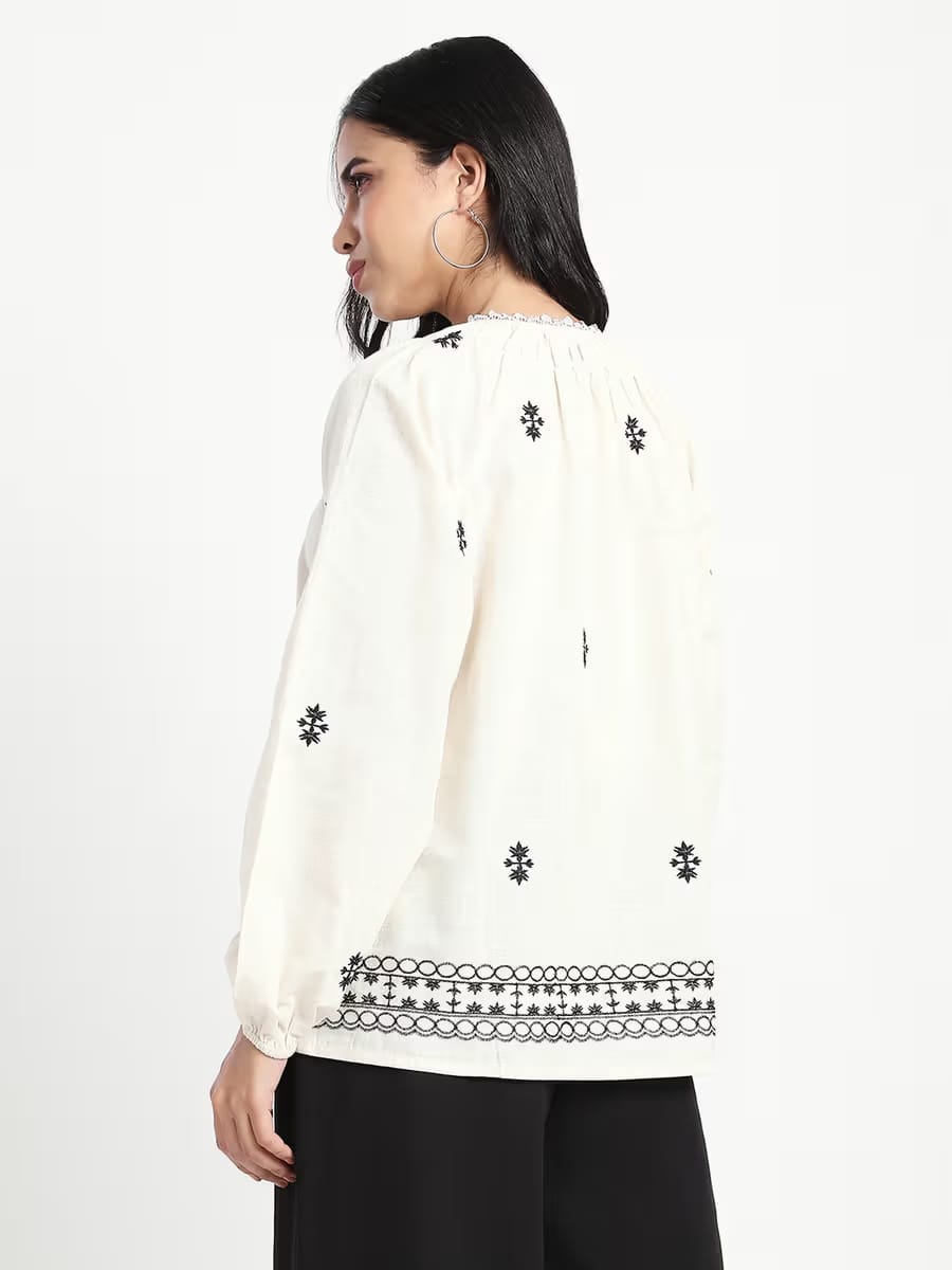 Women’s Off-White Embroidered Long Sleeve Top with Black Wide-Leg Pants – Casual Chic Outfit