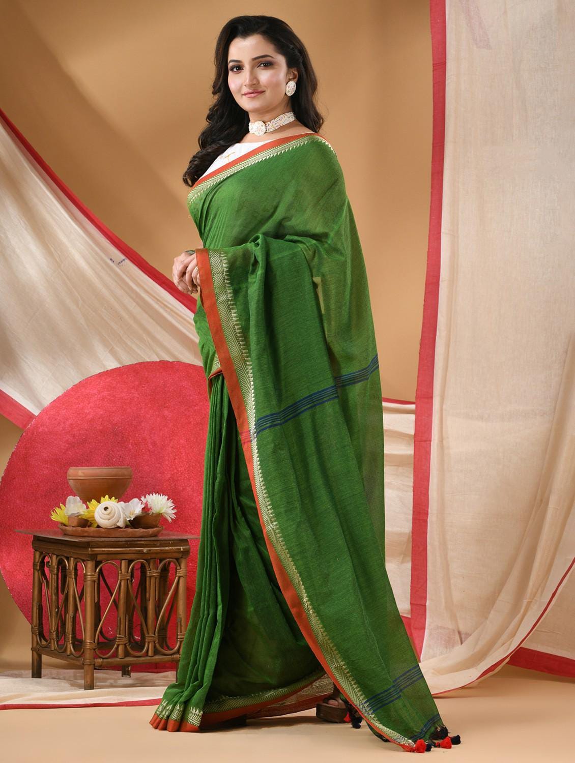Emerald Green Handloom Linen Cotton Saree with Rust Orange & Zari Temple Border