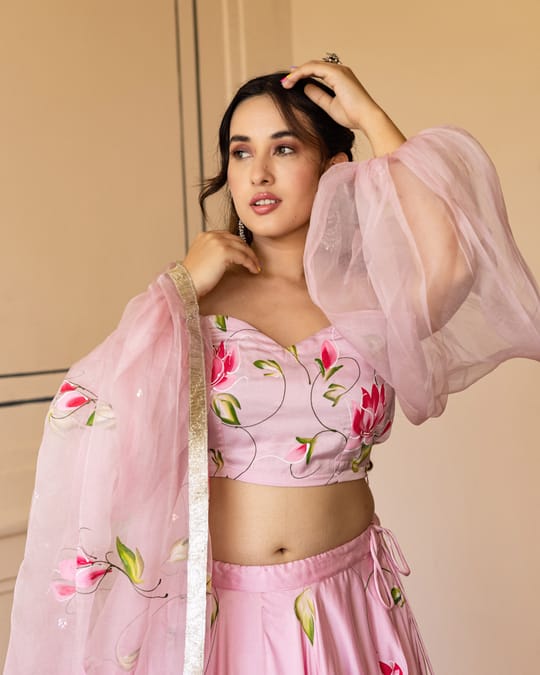 Women’s Baby Pink Hand-Painted Lotus Lehenga Choli Set with Off-Shoulder Sheer Balloon Sleeves