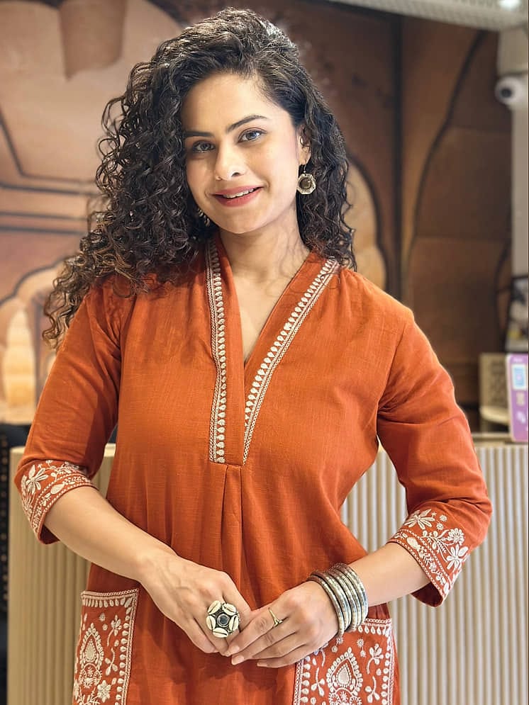 Women's Rust Orange Cotton Kurta Set with Embroidered Pockets & Trousers
